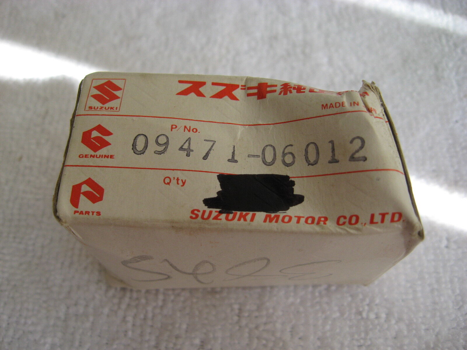 Suzuki OEM NOS bulb 09471-06012 DS80  #3924