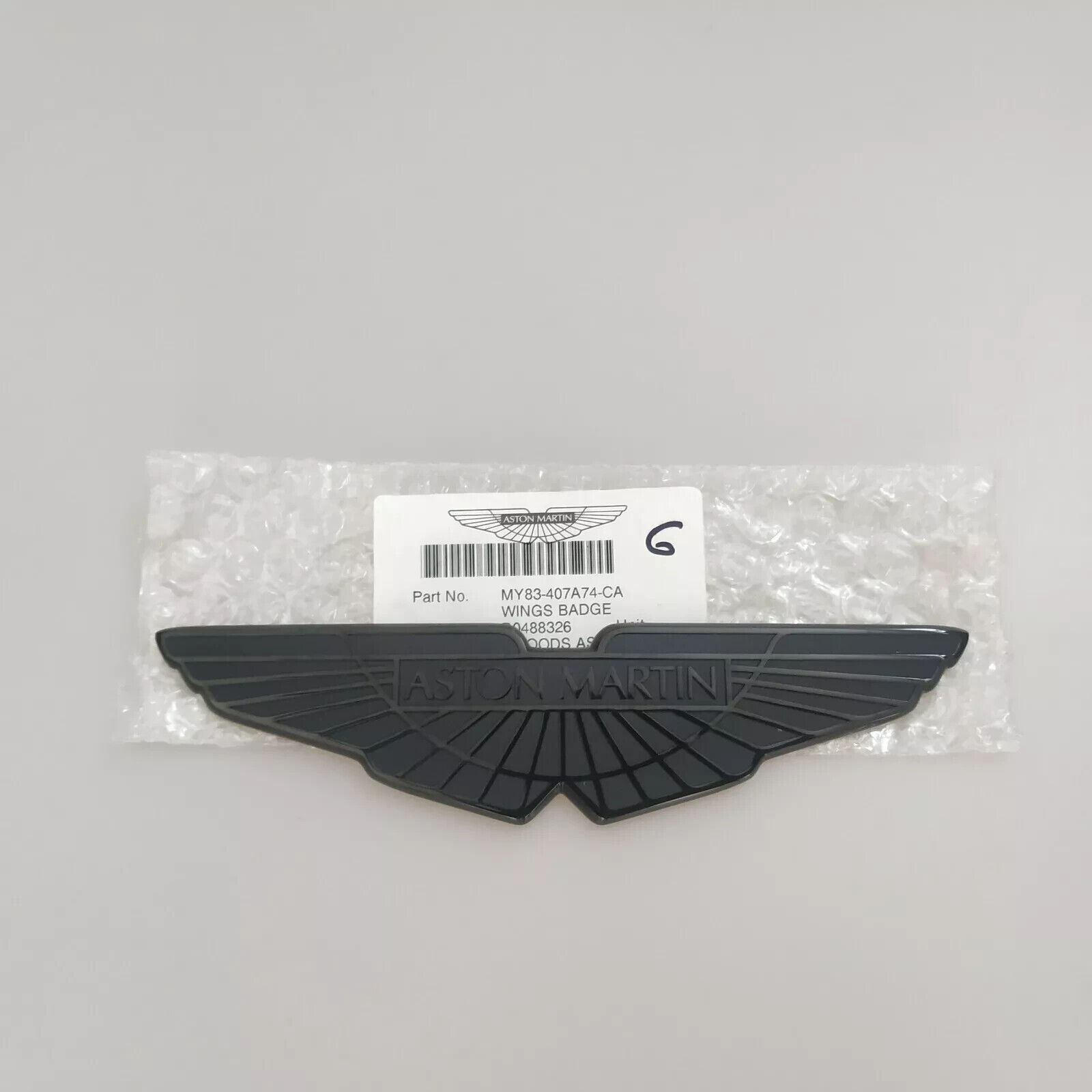 1XGenuine Aston Martin DBX Bonnet/Boot Black Badge MY83-407A74-CA New(18CM