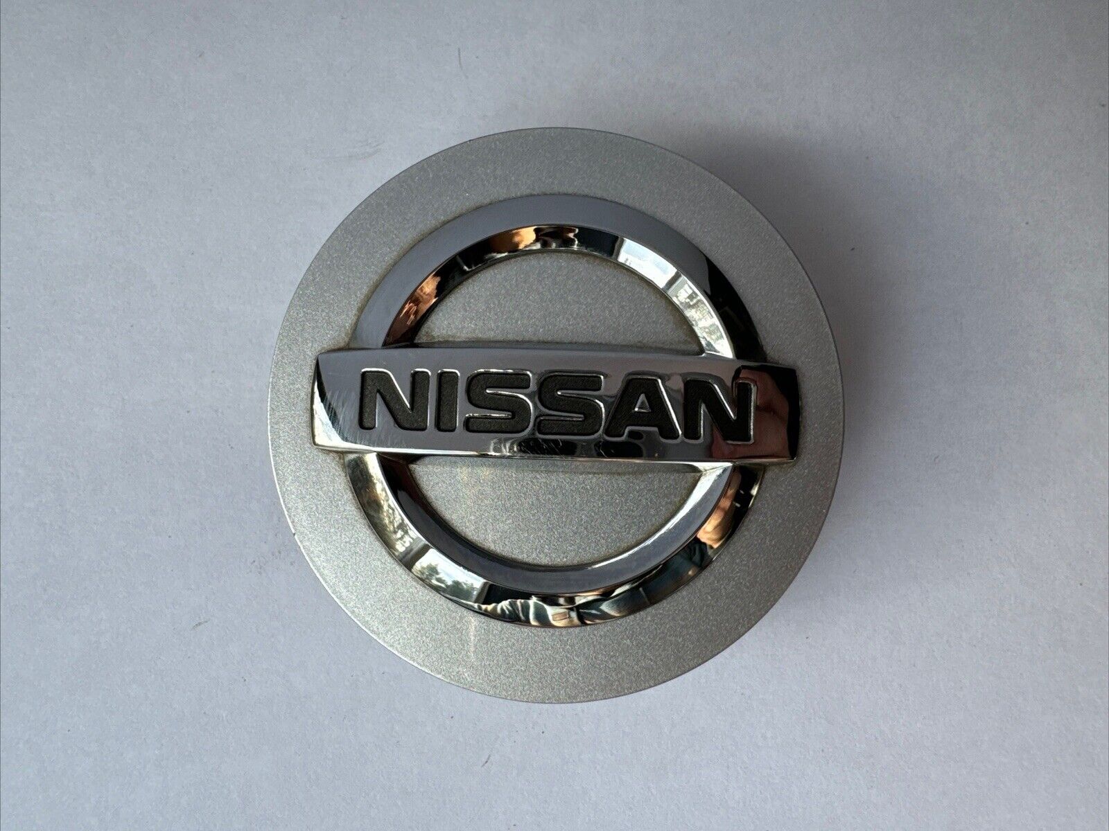 [OEM] NISSAN 350z 370z Altima GTR Leaf Pathfinder Center Cap (PN: 40342-ZM70B)