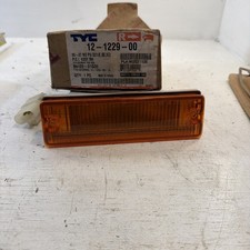 NOS Tyc 12-1229-00 RH Turn Signal / Parking Light Assembly 1986-87 Nissan D21 picture