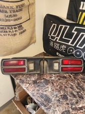 74-78 260Z 280Z  Driver Side and Passenger Side taillight Housings w/bezel OEM  picture