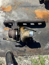 2005 dodge Cummins Stock turbo and manifold picture
