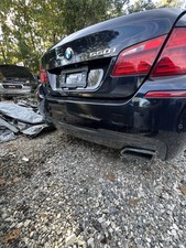 11-16 BMW F10 5 Series 550i Rear M-Sport Bumper In Carbon Black M Package picture
