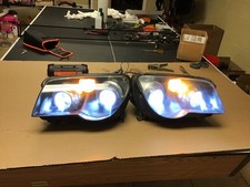chrysler crossfire left/right headlight w/bulbs and dust covers TESTED picture