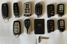 USED 12 COUNT KEY LOT, 11 OEM AND 1 KEY BLANK INSERT picture