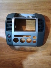 2005-2007 Nissan Pathfinder center dash radio-climate control trim bezel & vents picture