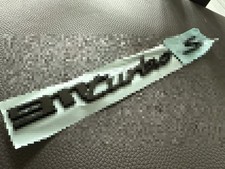 Porsche 992 911 Turbo S gloss black rear emblems picture