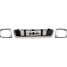 Grille and Headlight Door Kit For 1989-91 Toyota Pickup Center 4WD Chrome Shell picture