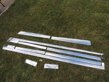 1980-1986 CADILLAC FLEETWOOD BROUGHAM SIDE ROCKER PANEL MOLDINGS LEFT RIGHT OEM picture