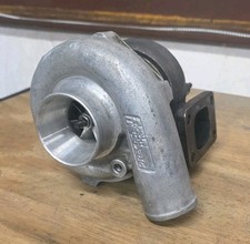 Precision Turbo PT4831 Journal Bearing  0.63 A/R T3 Inlet / 5-Bolt Out 385 HP picture
