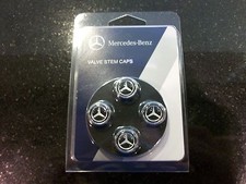 OEM GENUINE MERCEDES BENZ BLACK VALVE STEM CAPS WITH MB STAR  SET OF 4 picture
