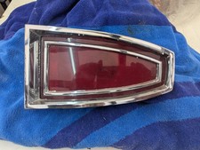 1965 mercury monterey tail light and 2 wind wing crank handles picture