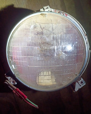 1960's chevrolet  both headlight assemblys picture