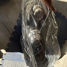 OEM Bi-Xenon headlights for the 2011–2012 Fisker Karma. Pair picture