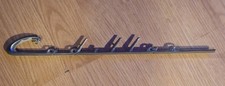 Vintage 1947-52 Cadillac Front Fender Script Emblem picture