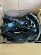 UD 41030Z5209 lined front drum brake shoe set 4EA REMAN NO CORE picture