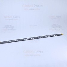 Toyota OEM ORNAMENT  BACK 7543560040 75435-60040 picture