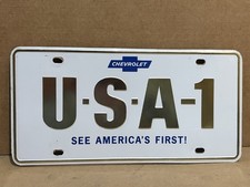1960s Chevrolet USA-1 Steel License Plate With Cardboard Backing - NICE SHAPE picture