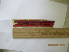 NOS 1990-1991 CHEVROLET CAMARO Z/28 PLASTIC STICK ON EMBLEM picture