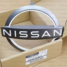 62890-6TA0A GENUINE OEM FRONT GRILLE LOGO EMBLEM BADGE - NISSAN PATHFINDER 22-25 picture
