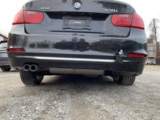 2012-2015 BMW 328i Rear Bumper Cover With Park Assist Black picture