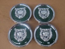 NEW JAGUAR WHEEL EMBLEM BADGE SET OF 4pcs SILVER HEAD GREEN BACKGROUND MNA6249AB picture