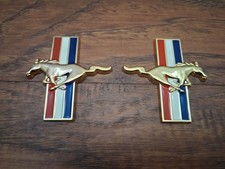 Ford Mustang tri-bar Running Horse Emblems Gold Pair picture