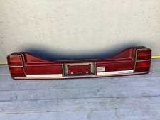 1986-1990 Oldsmobile Delta 88 Rear Center Tail Light Panel 20599039 OEM picture
