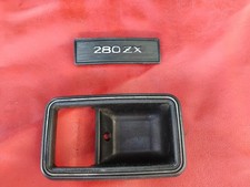 Datsun 1979-83 280zx OEM Door Escutcheon & Center Console Emblem picture