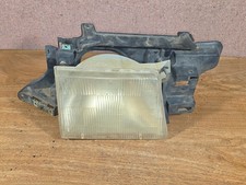 85-90 Ford Escort OEM Right Headlight Assembly, passenger picture