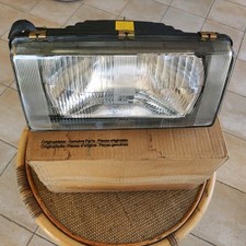 VOLVO NEW N.O.S.  GENUINE BOSCH HEADLAMP VOLVO 740/760 OEM 1321649-4 picture