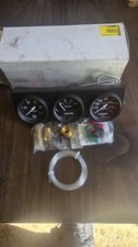 Auto Meter Gauge Set 2398; Auto Gage Water Temp/Volts/Oil, Black Panel 2-5/8 in. picture