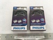 (2) NEW Philips 2-pk 21W LED Adapter CANbus 12V Automotive Warning Canceller picture