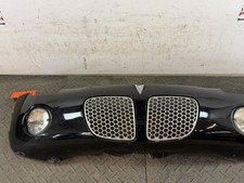 06-10 PONTIAC SOLSTICE FRONT BUMPER COVER BLACK HAS DAMAGE ON BOTTOM picture