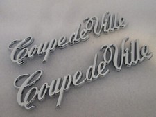 Cadillac OEM 1985-1995 Coupe deVille Chrome Emblem Badge Logo Nameplate **PAIR** picture