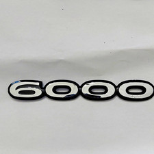 NOS OEM 1985-1991 PONTIAC 6000 REAR TRUNK EMBLEM BADGE SYMBOL LOGO SIGN picture