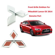MITSUBISHI LANCER EX 2014 PART NO 7415A603 FRONT GRILLE BADGE EMBLEM picture