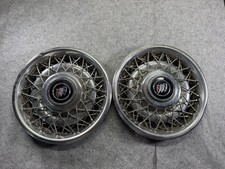Two genuine 1991 1992 Buick Roadmaster 15 inch wire spoke hubcap And Center Caps picture