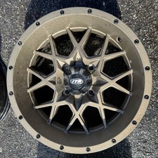 USED ITP Hurricane Bronze Wheel 14x7 picture