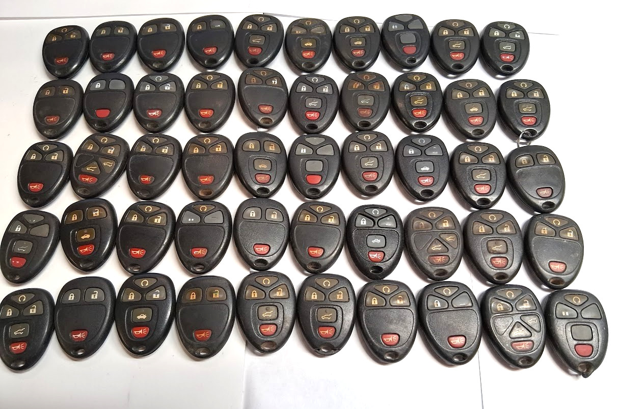 LOT OF 50 OEM STANDARD GM KEY FOB REMOTES OUC60221 3-6 BUTTONS