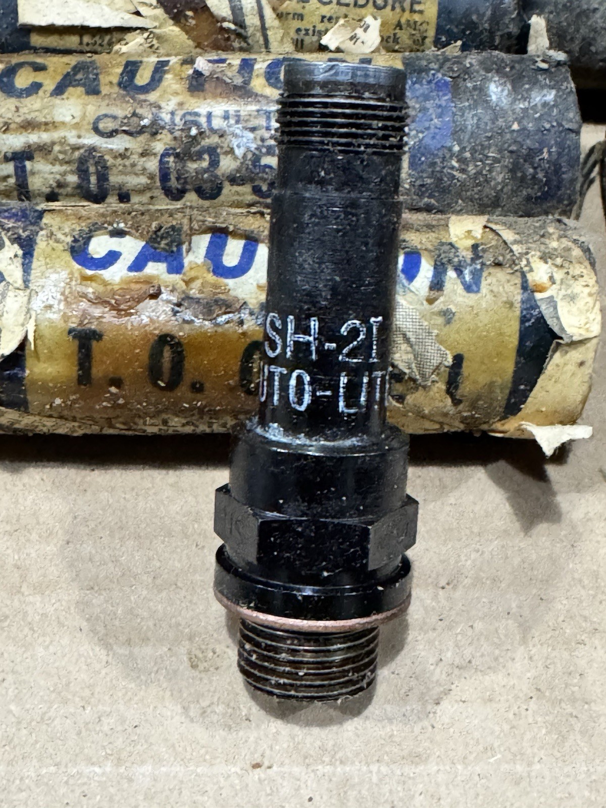 11 WWII & Korea Military Aircraft Spark Plugs in Original Wax-Sealed Containers