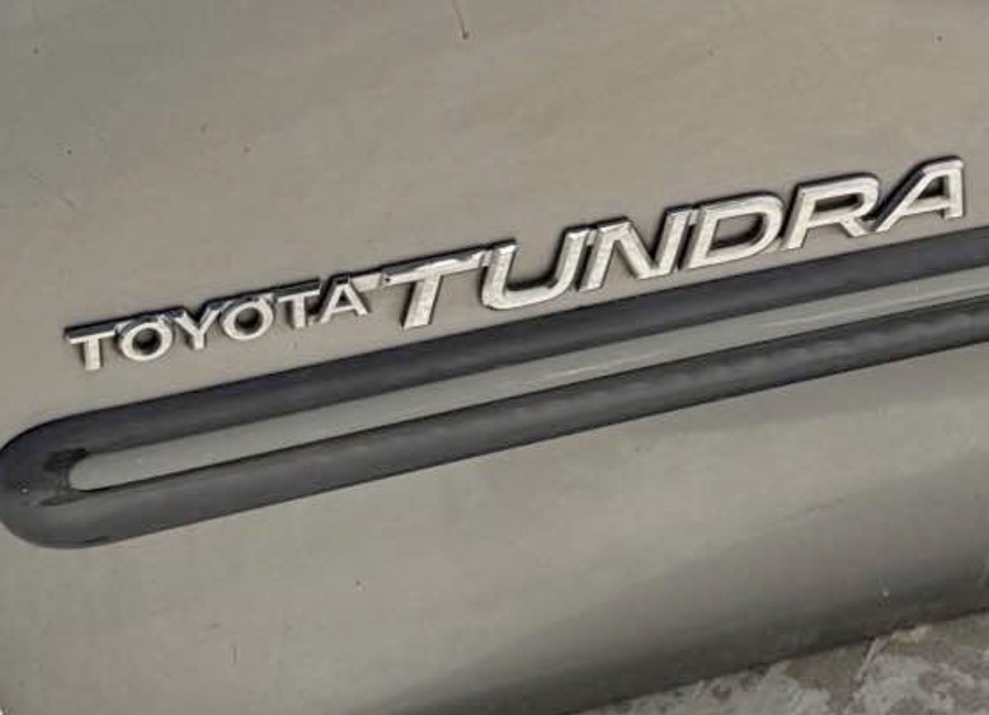 One 2000-2006 TOYOTA TUNDRA SIDE DOOR BADGE NAME OEM