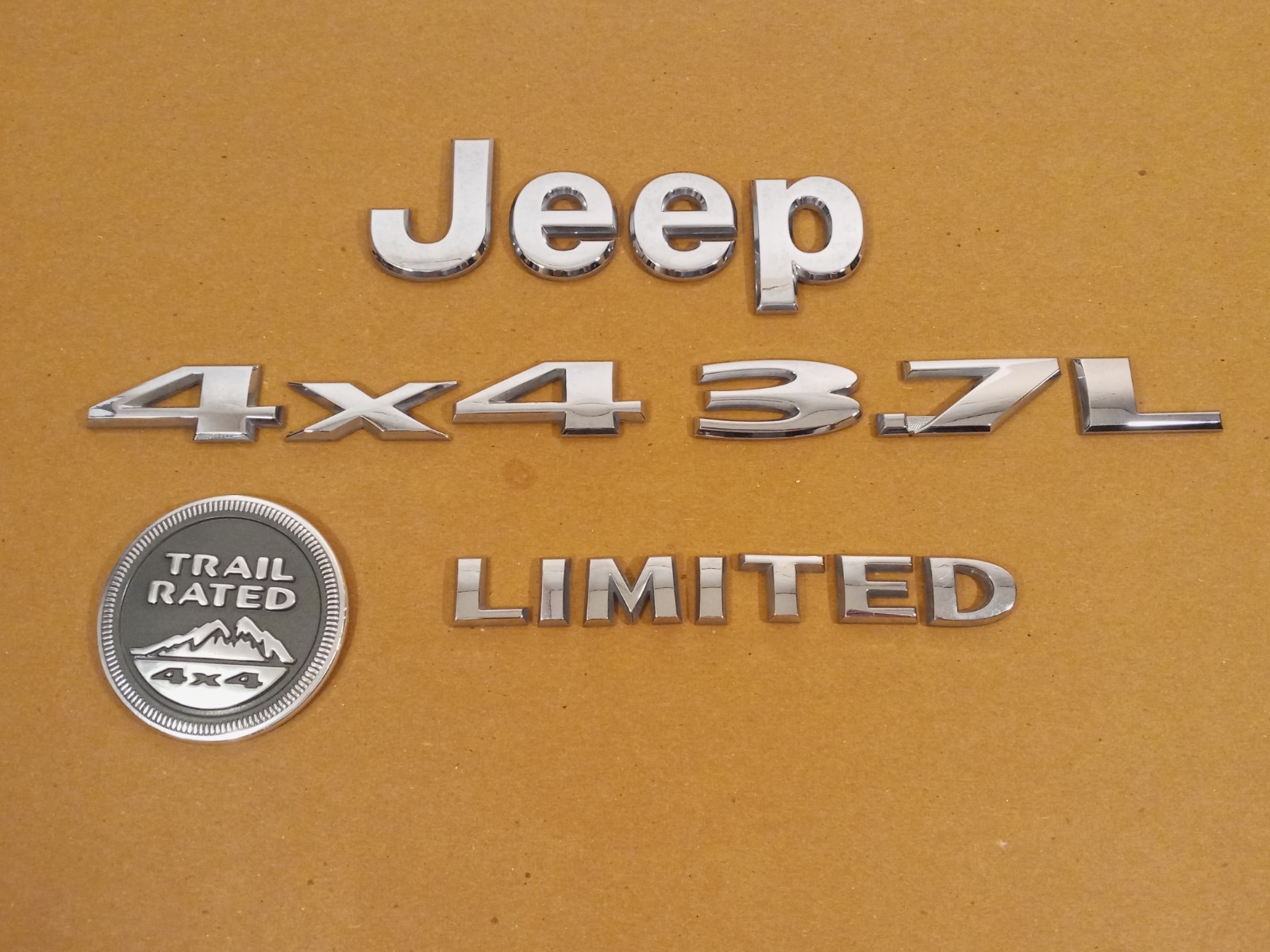 RARE Jeep Liberty 4x4 Rear Liftgate Emblem Logo Badge Nameplate OEM USED RARE Jeep Liberty 4x4 Rear Liftgate Emblem Logo Badge Nameplate OEM USED