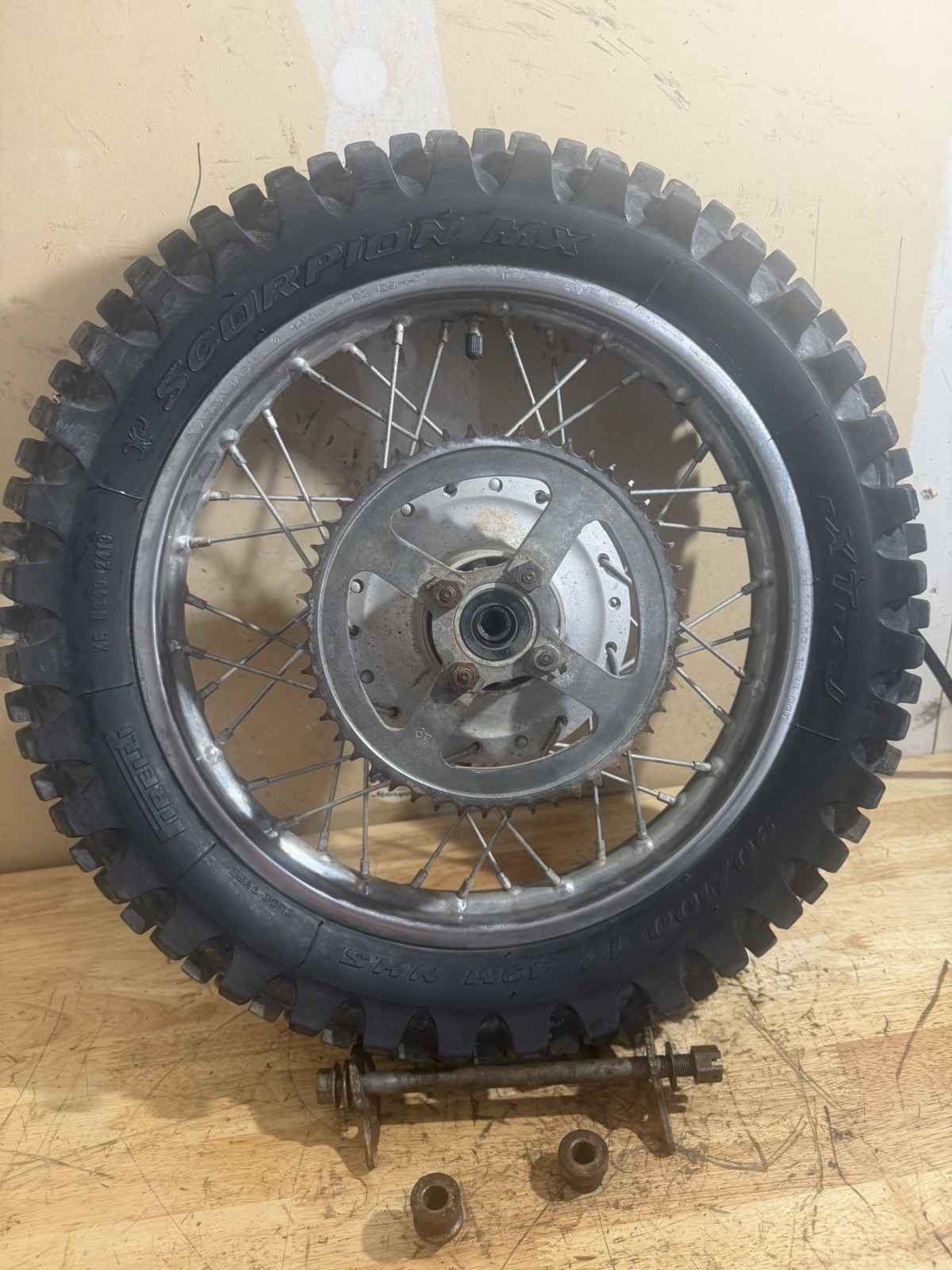 **2000-2008 YAMAHA TTR125 REAR WHEEL HUB TIRE 14” OEM W/AXLE**GOOD TIRE**