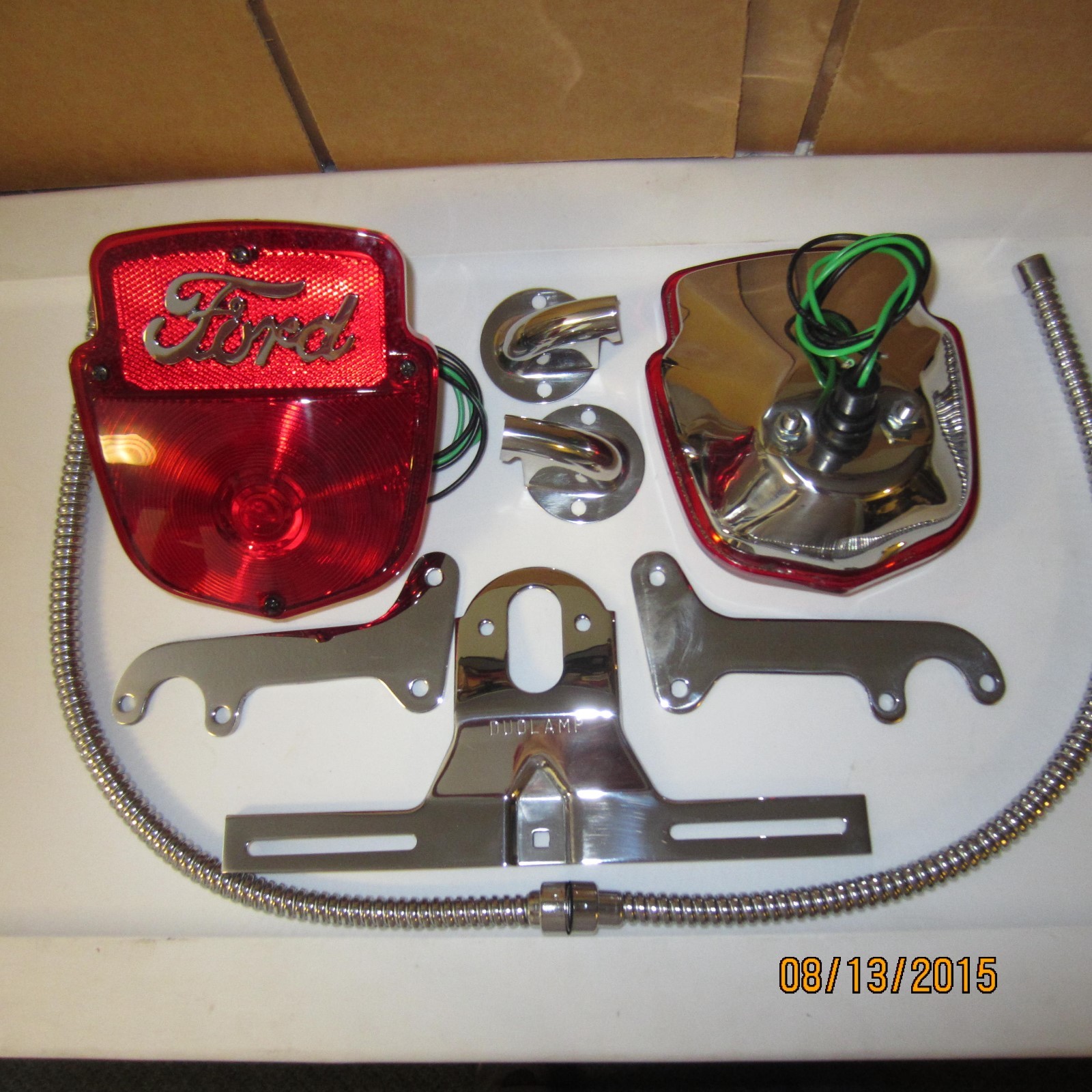 1953-56 Ford F100 stainless light kit, right & left pair with Ford script. 1953-56 Ford F100 stainless light kit, right & left pair with Ford script.