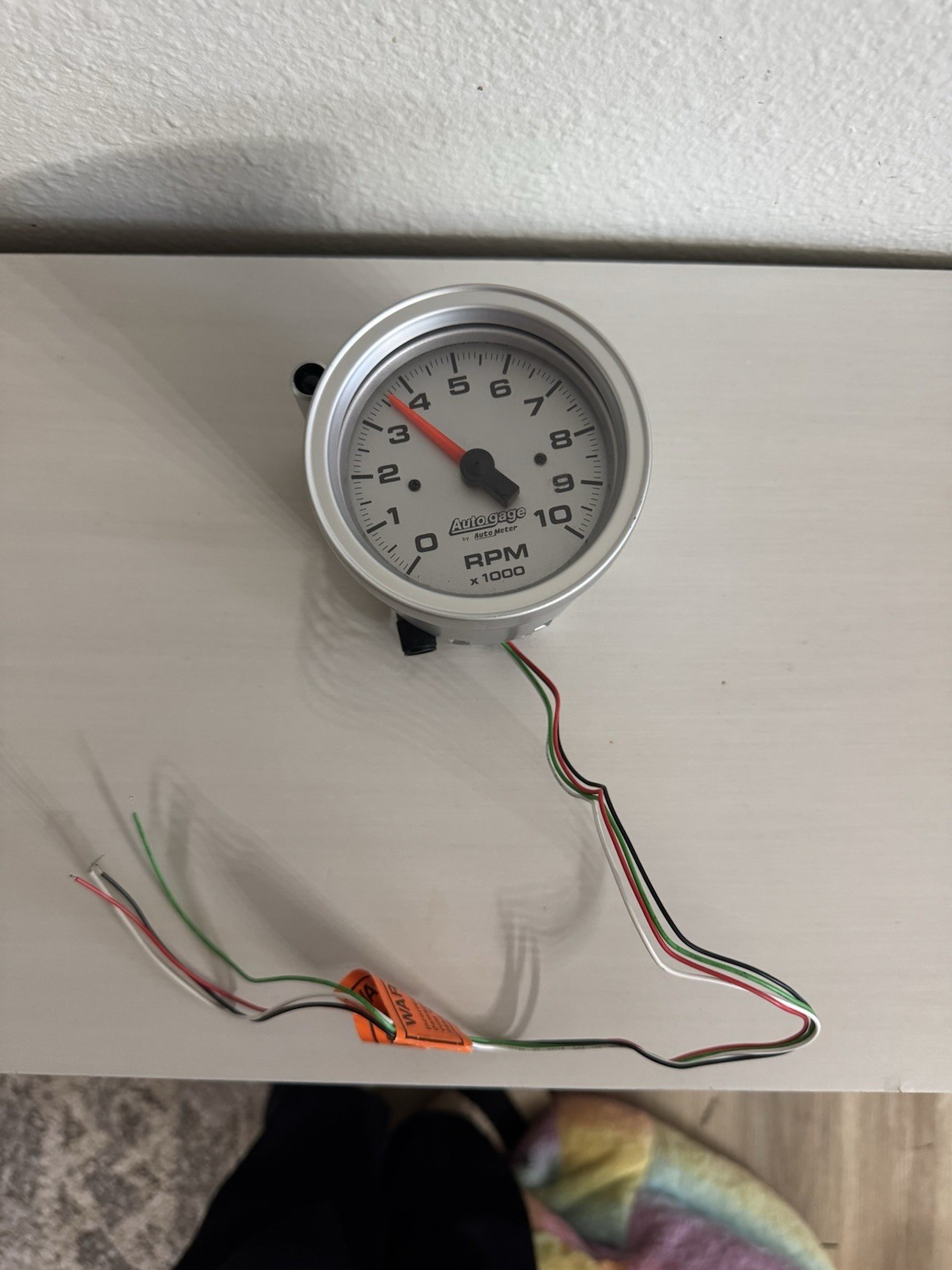 NEW Auto Meter Auto Gage Tachometer 0–10,000 RPM – Silver NEW Auto Meter Auto Gage Tachometer 0–10,000 RPM – Silver