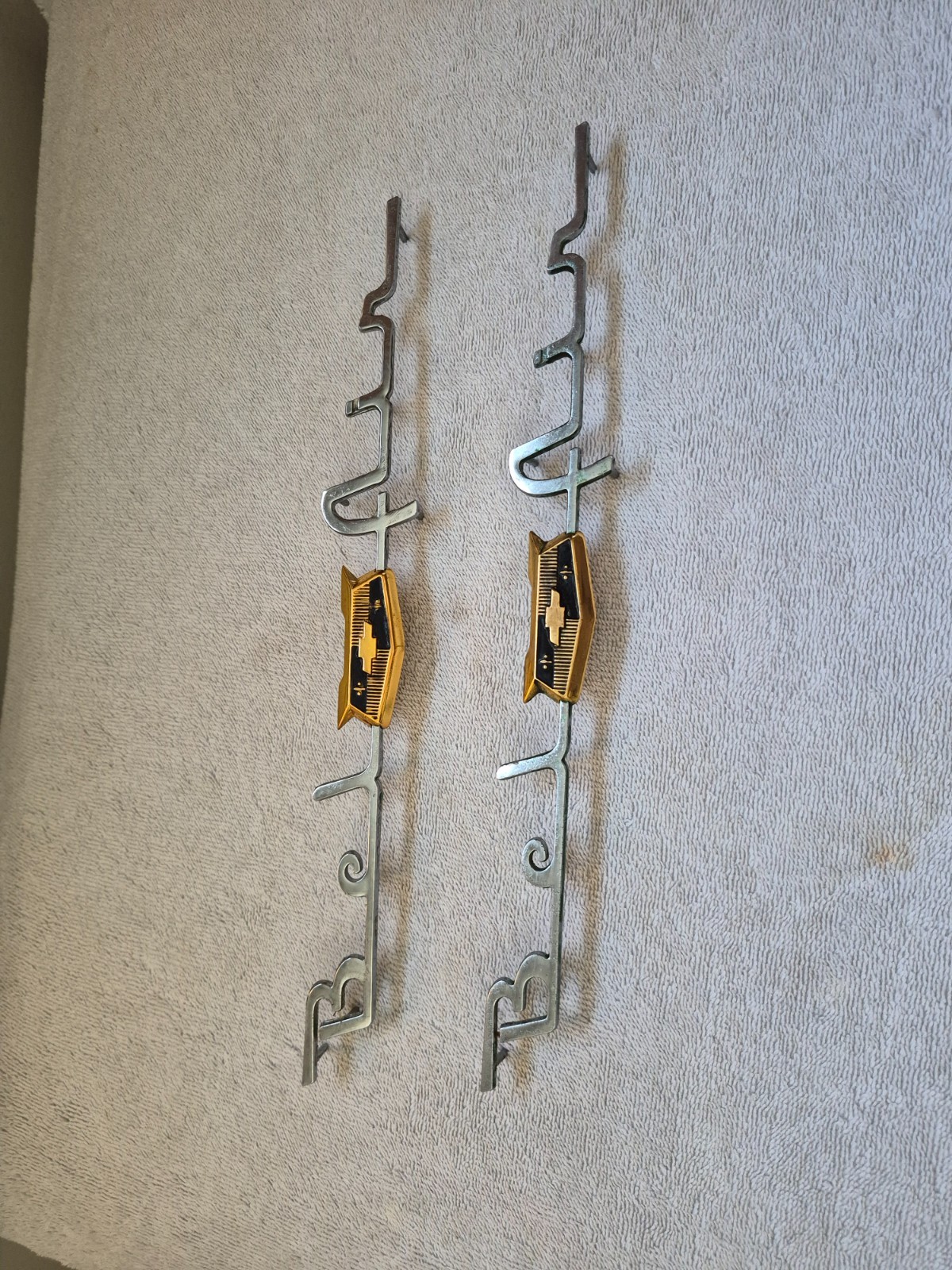 1953-54 chevy bel air emblem/script for rear fenders pair NOS. 1953-54 chevy bel air emblem/script for rear fenders pair NOS.
