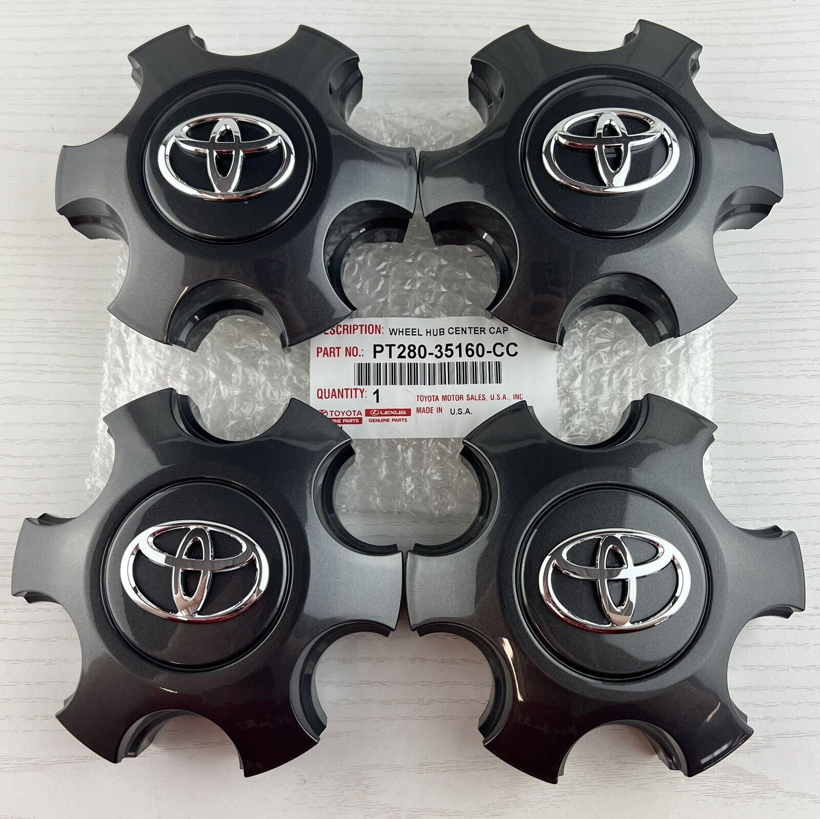 4 of 16-22 Toyota Tacoma OEM Center Cap 42603 YY290 NEW Charcoal PT280-35160 -CC 4 of 16-22 Toyota Tacoma OEM Center Cap 42603 YY290 NEW Charcoal PT280-35160 -CC