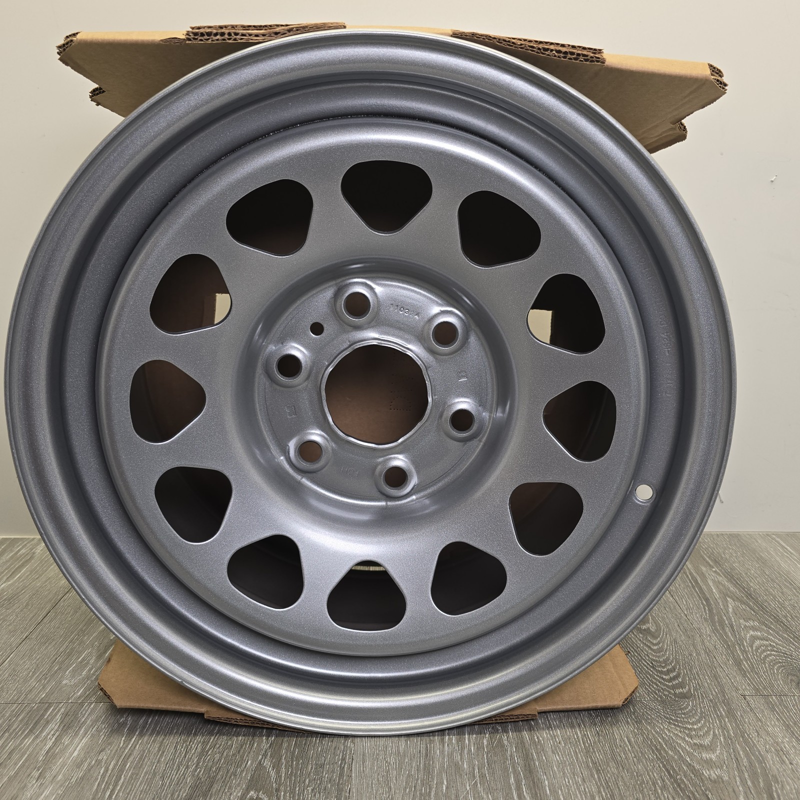 12 Hole Silver 17x8 Steel Factory Wheel  Remanufactured STLGN096U20 