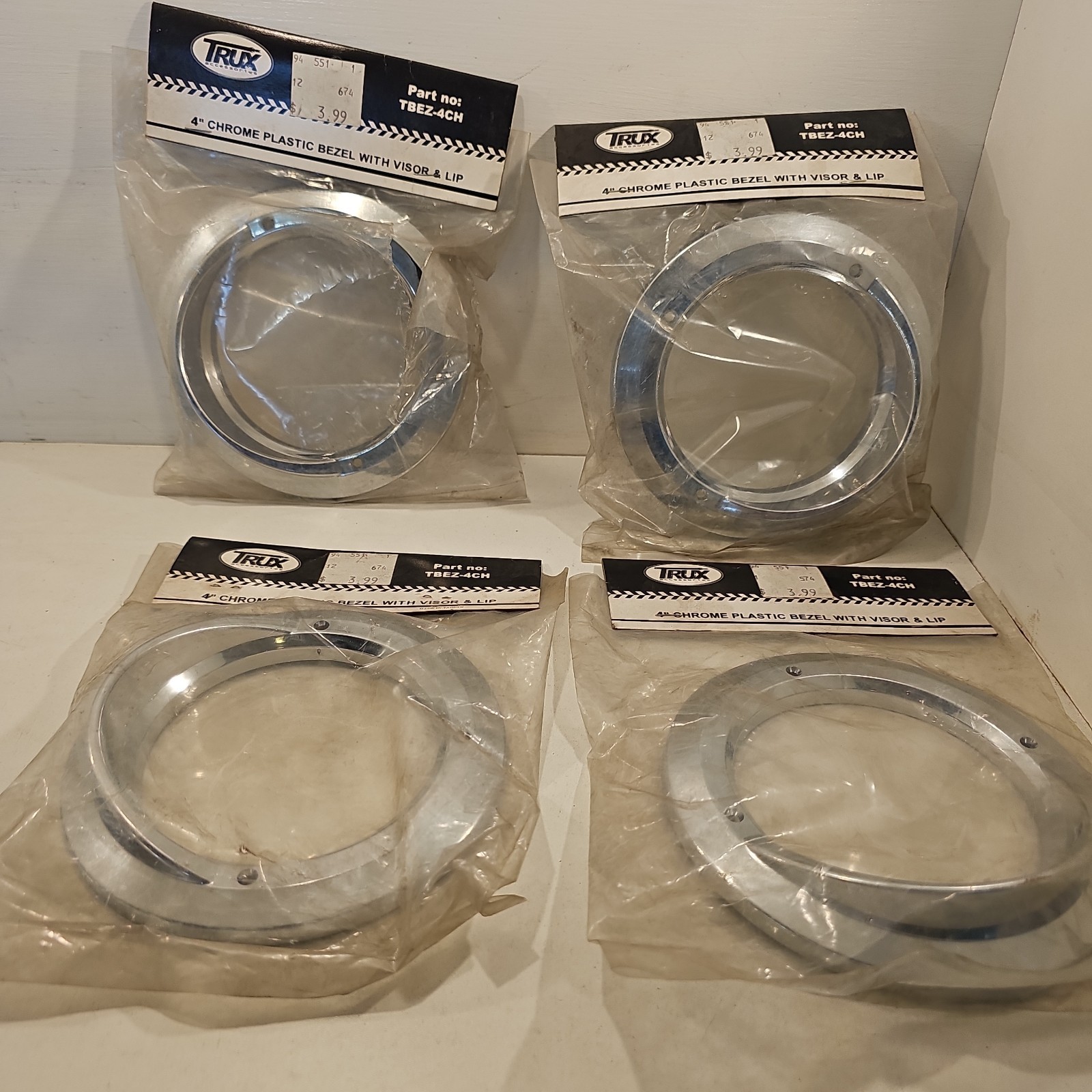 NEW LOT OF 4 TRUX Chrome Plastic Twist-On Bezel 4 NEW LOT OF 4 TRUX Chrome Plastic Twist-On Bezel 4